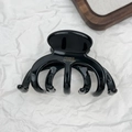Vista macro de la pinza para el pelo negra brillante con letras doradas France Handmade - Patrón de Calabaza / Estilo Calabaza Negro