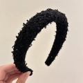 Detalle de diadema de tweed negra con textura brillante y acolchado grueso de esponja - Negro