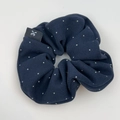 Navy blue polka dot scrunchie with soft twill fabric and a branded woven logo label - Hair Tie / Blue