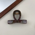 Close-up of a large red and green plaid hair claw clip with a glossy acrylic finish - Deep Plaid Small Flat Knot