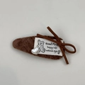 Close-up of brown velvet hair clip with handmade label bear pattern and heart pearl - Coffee Bear BB Clip