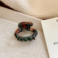 Elegant tortoise shell acetate hair claw clip in dark green and amber tones - Small Oval Claw Clip
