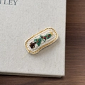 Christmas themed embroidered knit hair clip with green tree and golden edging details - White Base Christmas Tree