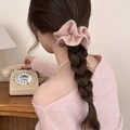 Chouchou en peluche tricoté rose pour femme, accessoire d'hiver élégant sur cheveux tressés - Rose