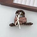 Close-up of leopard pattern hair claw clip with a cute plush brown bear and white bow - Coffee Plaid Hair Claw