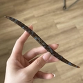 Detail of tortoise shell acetate hair stick with gold handmade logo on smooth surface - Blue Brown Gradient