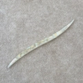 Macro shot of acetic acid hair pin detail with iridescent texture and Handmade engraving - Mermaid Color