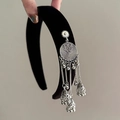 Detail of black velvet wide headband with retro ethnic silver tassel pendant - Black Single Sided Silver Tassel