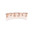 Grillz dentaire en or rose avec design effet goutte sur base blanche style hip-hop - Grillz en Or Rose Lave Volcanique