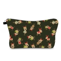Close-up of green Christmas toiletry bag with cute cartoon reindeer print and zipper - Dark Green Christmas Reindeer (hzb1028)