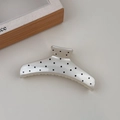 Detail of large French polka dot hair claw clip with glossy pearlescent white finish - Creamy White Curved Bar Style
