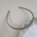 Vue détaillée du serre-tête gris translucide montrant les dents antidérapantes - Gris