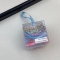 Macro view of assorted pastel bow hair ties organized in a clear plastic gift box - Macaron Bow (Style C)