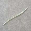 Macro view of French acetate hair pin showing pearl texture and curved crescent shape - Mermaid Color