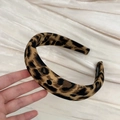 Close-up of handmade leopard print headband with premium fabric texture and label - Dark Leopard Headband (3cm)