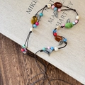 Detalle del cordón trenzado bohemio con cuentas coloridas y colgantes de hojas plateadas - Estilo de Cuentas con Colgante de Hoja (C款)