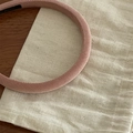 Close-up of pink headband showing premium twill fabric texture and durable inner lining - Lotus Pink