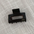 Detail showing high-quality acetate hair claw clip with gold FRANCE Handmade lettering - Chocolate Brown