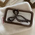 Pinza per capelli vintage con stampa leopardata a fiocco in resina lucida su tessuto bianco - Stile Papillon Leopardo Scuro