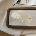 French vintage pearl white acetate hair claw clip with golden logo for elegant styling - Cream