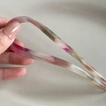 Detail of acetate U-shaped hair pin with Creation France engraving in pink amber gradient - Mermaid Purple