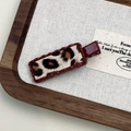 Fashionable rectangle leopard print hair clip with deep red wavy border on a white surface - Red Leopard Square Style