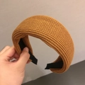 Minimalist wide knitted headband in ginger yellow featuring a thick retro woven texture - Turmeric
