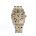 Macro shot of iced out tonneau watch dial with paved diamonds and gold numerals - Gold Silver Bi-color (W1461)