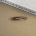 Close-up of brown acetate hair clip with rhinestones and Creation France lettering - Dark Coffee