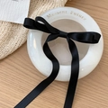 Elegant white ceramic vase with Moment Future print and a black satin ribbon bow - Black