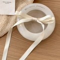 Elegant cream white satin ribbon bow hair clip with long streamers for women hairstyles - Off-white
