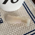 Detailed close-up of cream acetate hair clip with FRANCE Handmade engraving text - AB Color