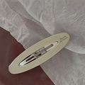 Hollow oval cream acetate hair clip with silver metal BB back and France lettering - Milk White