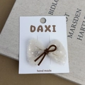 Detail of handmade cream lace bow hair clip with silver sequins and woven knot - Lace Sequin Knot Hair Accessory (No. 7)