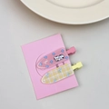 Cute set of 2 fruit-themed hair clips featuring cartoon puppy and plaid bow patterns - Cow Print Pair Clips