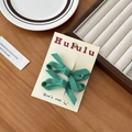 Set di due fermagli per capelli con fiocco in tessuto verde scuro per donne su carta - Verde
