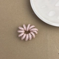 Élastique à cheveux rose en spirale avec une élégante texture de gelée translucide - Rose Clair