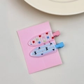 Set of 2 colorful striped and polka dot hair clips on a pink display card - Multicolor Polka Dot Pair Clips