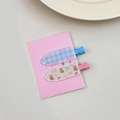Cute set of two hair clips featuring blue checkered patterns and pink bear designs - Bear Pair Clips