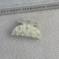 Detailed view of the pearlescent cream hair claw clip with sparkling rhinestones decoration - Mermaid Color
