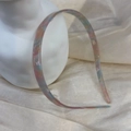 Detail showing the colorful marble pattern and anti-slip teeth on the acetate headband - Mermaid Purple