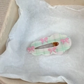 Green and pink checkered BB hair clip with 3D bows and pearls on a paper box - Green Plaid Bow
