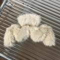Detailed top view of large beige plush shark hair clip with soft faux fur texture - Extra Large / Off White