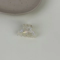 Dettaglio del fermaglio per capelli in acetato con strass e marchio fatto a mano - colore sirena