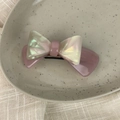 Macro view of a 3D double-layered acetate bow hair clip with a pearlescent finish - 3D Bow-Coffee