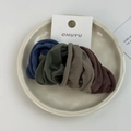 Detail view of 4-pack vintage fabric hair scrunchies in deep jewel tones on display card - Morandi Colors