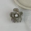 Detail of smoky gray acetic acid hair claw with white pearl center flower design - Gray