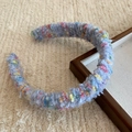 Plush light blue knit headband with colorful yarn specks in a French vintage style - Milky Blue