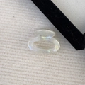 Detailed close-up of a French style handmade acetate hair claw with pearlescent finish - AB White