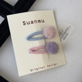 Close-up of wool felt BB hair clips with soft macaron colored pom poms on a display card - Plush Ball Hair Clip / Pink and Purple Pom-pom